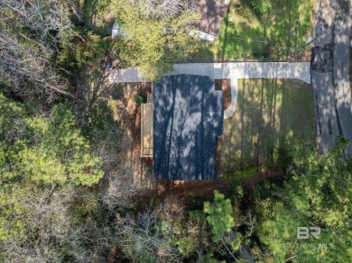 Enjoy living in convenient Lake Forest in this updated one-story on Lake Forest Yacht and Country Club in Alabama - for sale on GolfHomes.com, golf home, golf lot