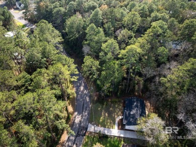 Enjoy living in convenient Lake Forest in this updated one-story on Lake Forest Yacht and Country Club in Alabama - for sale on GolfHomes.com, golf home, golf lot