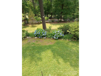 Charming and unique home nestled in Country Club Estates on Hendersonville Country Club in North Carolina - for sale on GolfHomes.com, golf home, golf lot