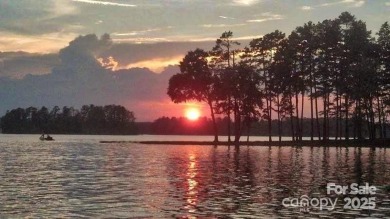 This Badin Lake waterfront lot is located in the prestigious on Old North State Club at Uwharrie Point Golf community in North Carolina - for sale on GolfHomes.com, golf home, golf lot