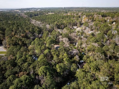 Enjoy living in convenient Lake Forest in this updated one-story on Lake Forest Yacht and Country Club in Alabama - for sale on GolfHomes.com, golf home, golf lot