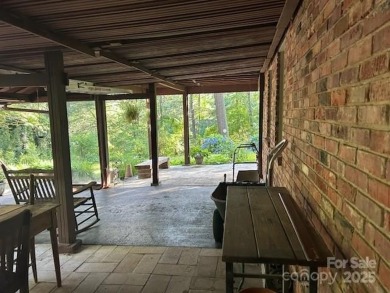 Charming and unique home nestled in Country Club Estates on Hendersonville Country Club in North Carolina - for sale on GolfHomes.com, golf home, golf lot