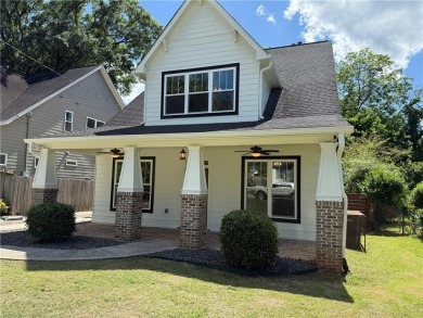 Welcome to this stunning 4-bedroom, 4-bathroom home located in on East Lake Golf Club in Georgia - for sale on GolfHomes.com, golf home, golf lot