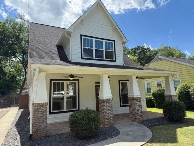 Welcome to this stunning 4-bedroom, 4-bathroom home located in on East Lake Golf Club in Georgia - for sale on GolfHomes.com, golf home, golf lot