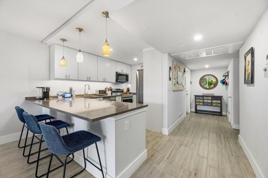 Live the life you've been dreaming of in Palm Aire. Wake up on Palm-Aire Country Club and Resort - The Oaks in Florida - for sale on GolfHomes.com, golf home, golf lot