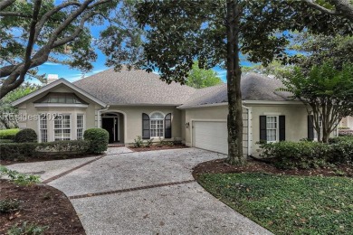 Cottage Lake is the setting of this perfect home in Belfair with on Belfair Golf Club in South Carolina - for sale on GolfHomes.com, golf home, golf lot