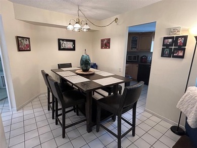 Welcome to this beautifully updated third-floor residence in the on Colony West Country Club in Florida - for sale on GolfHomes.com, golf home, golf lot