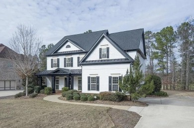 Welcome to your dream home in the prestigious Heron Bay on Canongate At Heron Bay in Georgia - for sale on GolfHomes.com, golf home, golf lot