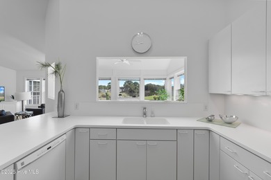 This townhome offers a spectacular water and golf view and is on Members Club At St. James Plantation in North Carolina - for sale on GolfHomes.com, golf home, golf lot