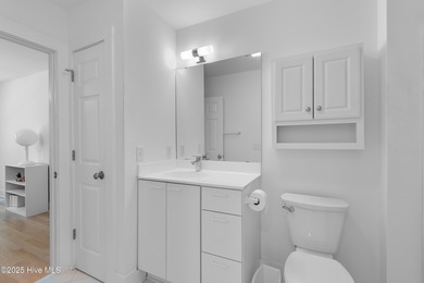 This townhome offers a spectacular water and golf view and is on Members Club At St. James Plantation in North Carolina - for sale on GolfHomes.com, golf home, golf lot