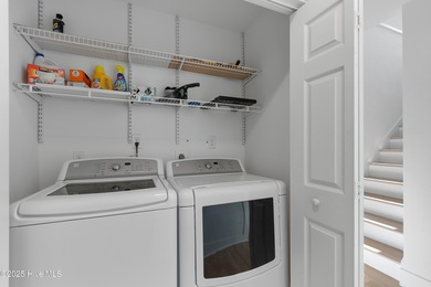 This townhome offers a spectacular water and golf view and is on Members Club At St. James Plantation in North Carolina - for sale on GolfHomes.com, golf home, golf lot