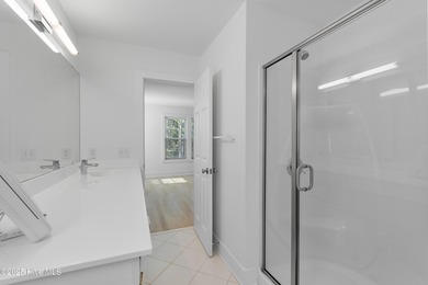 This townhome offers a spectacular water and golf view and is on Members Club At St. James Plantation in North Carolina - for sale on GolfHomes.com, golf home, golf lot