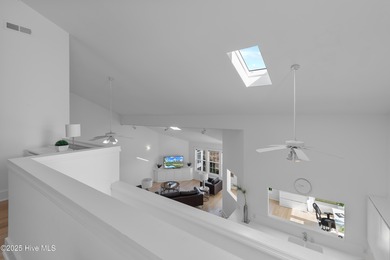 This townhome offers a spectacular water and golf view and is on Members Club At St. James Plantation in North Carolina - for sale on GolfHomes.com, golf home, golf lot