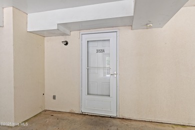 This townhome offers a spectacular water and golf view and is on Members Club At St. James Plantation in North Carolina - for sale on GolfHomes.com, golf home, golf lot