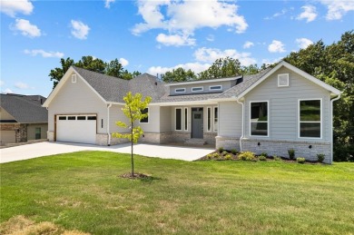This beautiful new construction is located in the highly desired on Big Sugar Golf Club in Arkansas - for sale on GolfHomes.com, golf home, golf lot