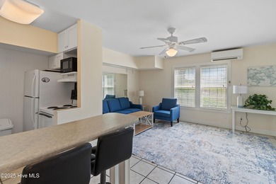 This townhome offers a spectacular water and golf view and is on Members Club At St. James Plantation in North Carolina - for sale on GolfHomes.com, golf home, golf lot