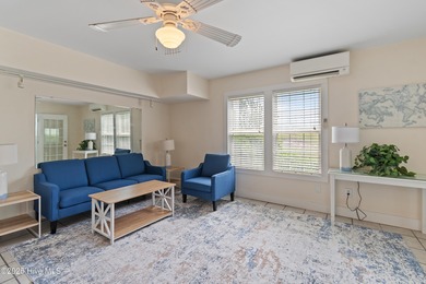 This townhome offers a spectacular water and golf view and is on Members Club At St. James Plantation in North Carolina - for sale on GolfHomes.com, golf home, golf lot