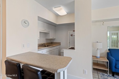 This townhome offers a spectacular water and golf view and is on Members Club At St. James Plantation in North Carolina - for sale on GolfHomes.com, golf home, golf lot