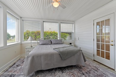 This townhome offers a spectacular water and golf view and is on Members Club At St. James Plantation in North Carolina - for sale on GolfHomes.com, golf home, golf lot