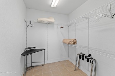 This townhome offers a spectacular water and golf view and is on Members Club At St. James Plantation in North Carolina - for sale on GolfHomes.com, golf home, golf lot