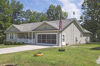 Welcome to this beautifully maintained 3 bedroom, 2.5 bath home on Lake Tansi Village Country Club in Tennessee - for sale on GolfHomes.com, golf home, golf lot