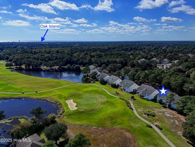 This townhome offers a spectacular water and golf view and is on Members Club At St. James Plantation in North Carolina - for sale on GolfHomes.com, golf home, golf lot