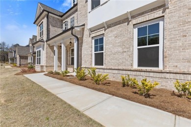 Welcome to the stunning Woodland model by Paran Homes, nestled on Traditions of Braselton Golf Club in Georgia - for sale on GolfHomes.com, golf home, golf lot
