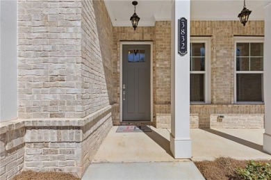 Welcome to the stunning Woodland model by Paran Homes, nestled on Traditions of Braselton Golf Club in Georgia - for sale on GolfHomes.com, golf home, golf lot