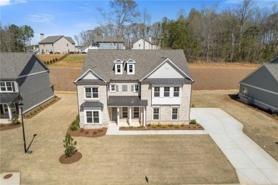 Welcome to the stunning Woodland model by Paran Homes, nestled on Traditions of Braselton Golf Club in Georgia - for sale on GolfHomes.com, golf home, golf lot