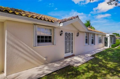 BRAND NEW ROOF & GUTTERS! Enjoy Peace and Tranquility with on Lost Lake Golf Club in Florida - for sale on GolfHomes.com, golf home, golf lot