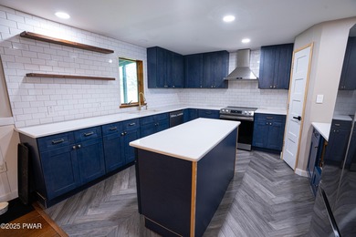 Welcome to this beautifully renovated and spacious ranch home on The Hideout Golf in Pennsylvania - for sale on GolfHomes.com, golf home, golf lot