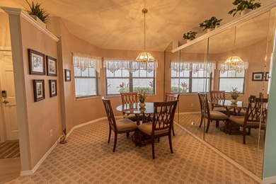 Embrace the ultimate Florida lifestyle in this 3/2/2 home on St. Lucie Trail Golf Club in Florida - for sale on GolfHomes.com, golf home, golf lot