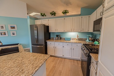 Embrace the ultimate Florida lifestyle in this 3/2/2 home on St. Lucie Trail Golf Club in Florida - for sale on GolfHomes.com, golf home, golf lot