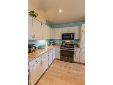 Embrace the ultimate Florida lifestyle in this 3/2/2 home on St. Lucie Trail Golf Club in Florida - for sale on GolfHomes.com, golf home, golf lot