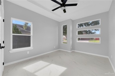 Step into modern comfort with this beautifully designed on Los Lagos Golf Club in Texas - for sale on GolfHomes.com, golf home, golf lot
