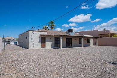 VERY clean 2-bedroom, 2-bathroom home with a versatile den! This on London Bridge Golf Course in Arizona - for sale on GolfHomes.com, golf home, golf lot