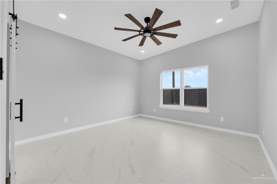 Step into modern comfort with this beautifully designed on Los Lagos Golf Club in Texas - for sale on GolfHomes.com, golf home, golf lot