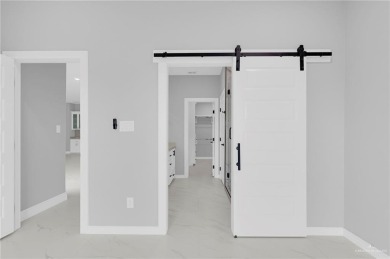 Step into modern comfort with this beautifully designed on Los Lagos Golf Club in Texas - for sale on GolfHomes.com, golf home, golf lot
