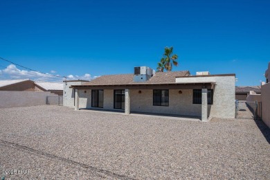 VERY clean 2-bedroom, 2-bathroom home with a versatile den! This on London Bridge Golf Course in Arizona - for sale on GolfHomes.com, golf home, golf lot