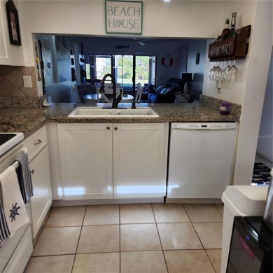 NON FLOODED 1st FLOOR WATERFRONT VILLA IN ISLA DEL SOL*** This on Isla Del Sol Yacht and Country Club in Florida - for sale on GolfHomes.com, golf home, golf lot