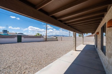 VERY clean 2-bedroom, 2-bathroom home with a versatile den! This on London Bridge Golf Course in Arizona - for sale on GolfHomes.com, golf home, golf lot
