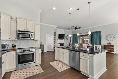 Mediterranean elegance meets refined coastal living in this on Barefoot Resort and Golf Club  in South Carolina - for sale on GolfHomes.com, golf home, golf lot