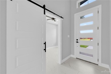 Step into modern comfort with this beautifully designed on Los Lagos Golf Club in Texas - for sale on GolfHomes.com, golf home, golf lot