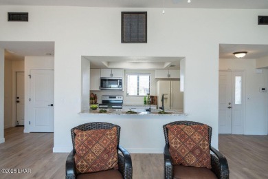VERY clean 2-bedroom, 2-bathroom home with a versatile den! This on London Bridge Golf Course in Arizona - for sale on GolfHomes.com, golf home, golf lot