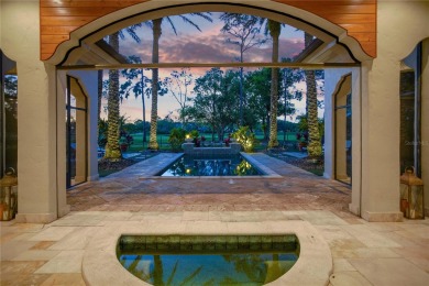 Inspired by a Tuscan vision, this stunning residence was built on Lake Nona Golf Club, Inc. in Florida - for sale on GolfHomes.com, golf home, golf lot