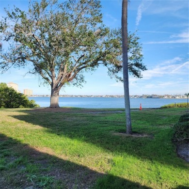 NON FLOODED 1st FLOOR WATERFRONT VILLA IN ISLA DEL SOL*** This on Isla Del Sol Yacht and Country Club in Florida - for sale on GolfHomes.com, golf home, golf lot