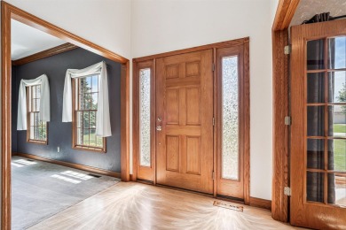 Set in a highly desirable neighborhood near the golf course on Hart Ridge Golf Course in Iowa - for sale on GolfHomes.com, golf home, golf lot