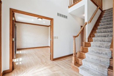 Set in a highly desirable neighborhood near the golf course on Hart Ridge Golf Course in Iowa - for sale on GolfHomes.com, golf home, golf lot