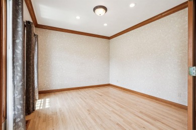 Set in a highly desirable neighborhood near the golf course on Hart Ridge Golf Course in Iowa - for sale on GolfHomes.com, golf home, golf lot