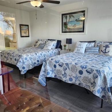 NON FLOODED 1st FLOOR WATERFRONT VILLA IN ISLA DEL SOL*** This on Isla Del Sol Yacht and Country Club in Florida - for sale on GolfHomes.com, golf home, golf lot